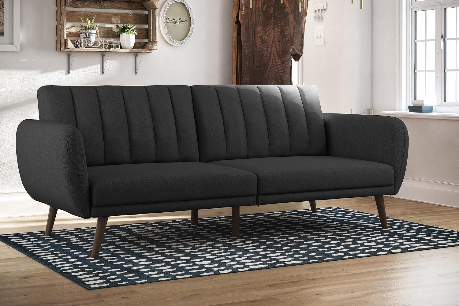 Novogratz Brittany 82 Inch Futon Sofa Bed in Faux Leather, Upholstered Couch Sleeper with Tufted Back, Mid-Century Modern Design, Dark Gray