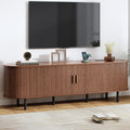 70.8' TV Stand with Power Outlet, Mid-Century Modern Television Stand, Fluted Media Console with Sliding Doors, Entertainment Center for TVs up to 60 Inch, Adjustable Shelves, Walnut